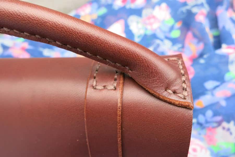 Mini satchel leather handbag detail of handle