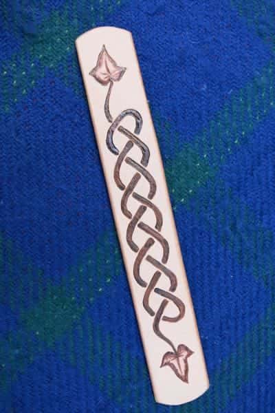 Ivy leaf leather bookmark on red book