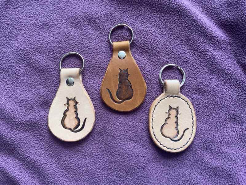 3 leather key fobs / key rings with cat motifs