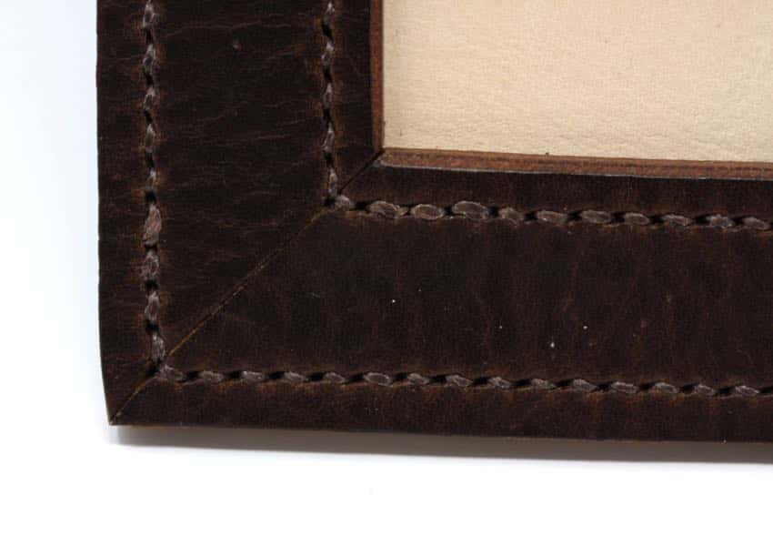detail of leather picture frame