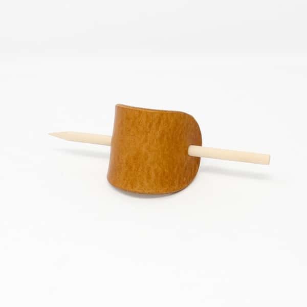 Plan tan leather hair barrette