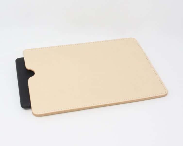 Cream leather tablet sleeve containing a Kindle