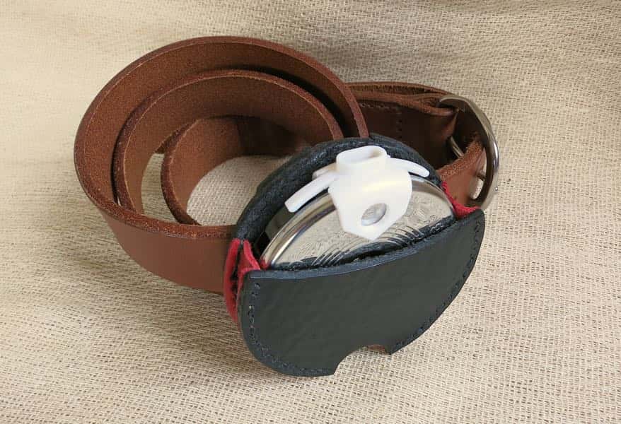 Black leather pitch pipe holster on a belt