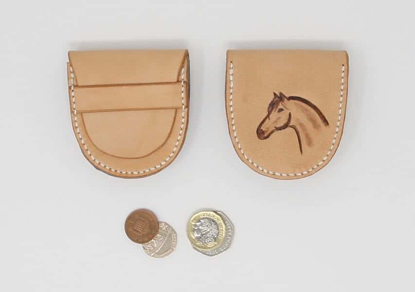 Natural leather coin pouch showing front and rear with horse motif