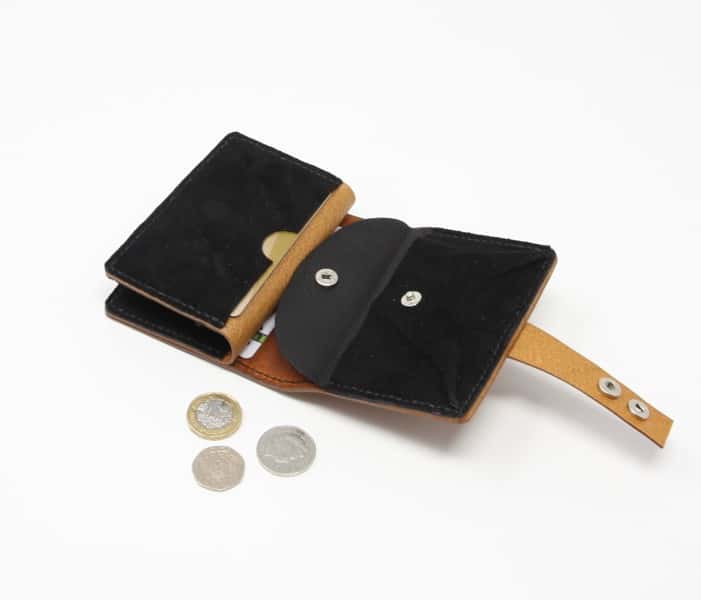 Tan leather jumbo wallet with brown leather lining. Shown open.